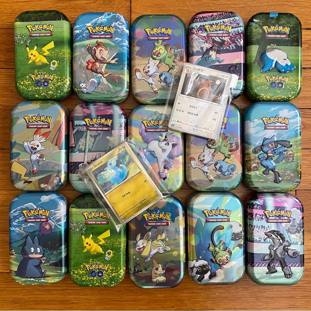 Bundle of 1,000ish Pokémon Cards in Open Mini Tins
